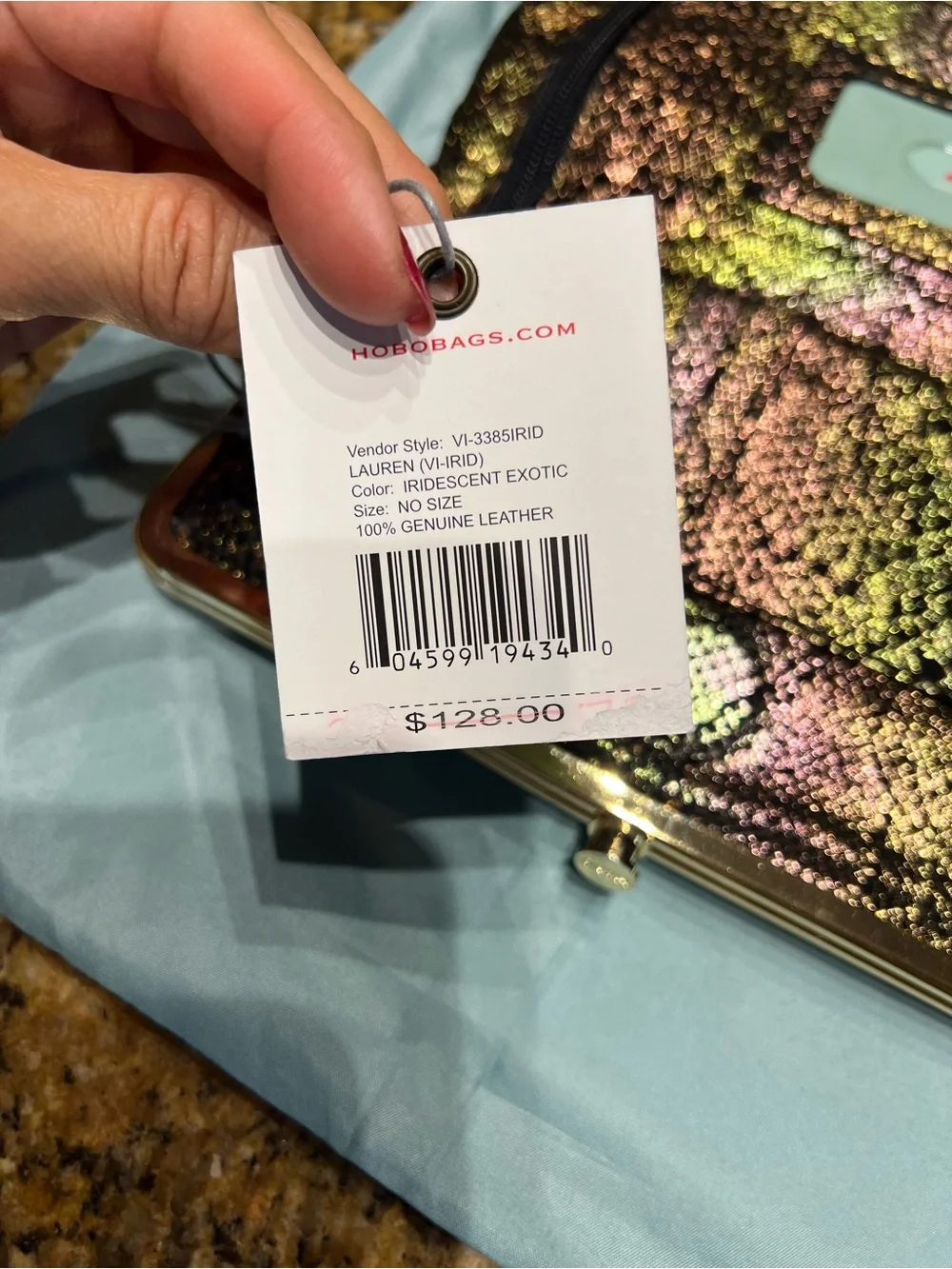 HOBO Iridescent Snake-Embossed Clutch in Brown and Black